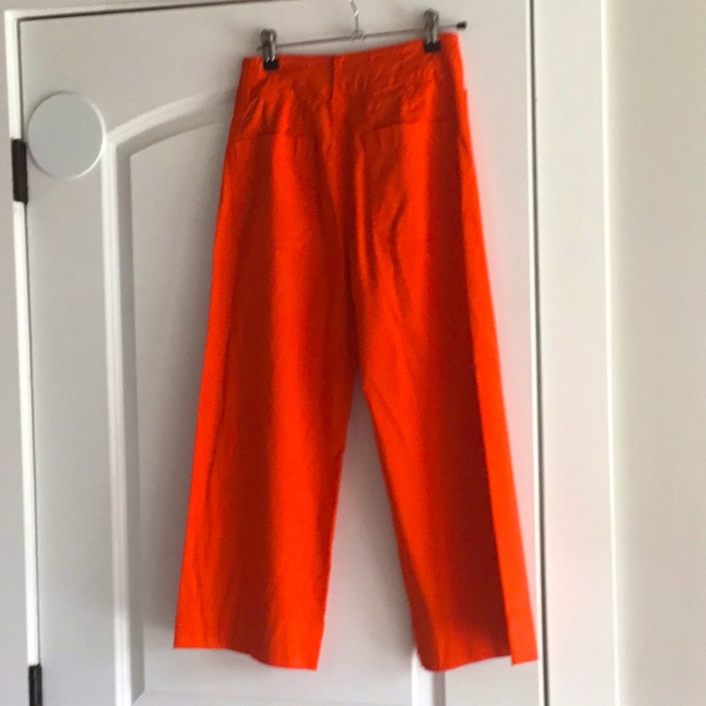Anthropologie by Maeve , Collete wide leg cropped pants in bright orange.